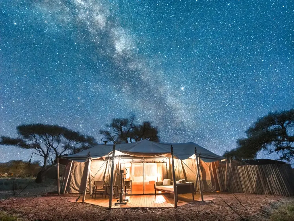 Tented Lodge under the star-studded African sky at One Nature Nyaruswiga in the Serengeti.