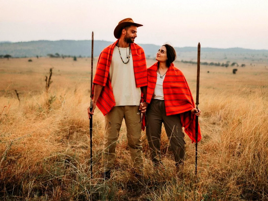 Lovely couple gazing at each other in Serengeti National Park near One Nature Nyaruswiga.