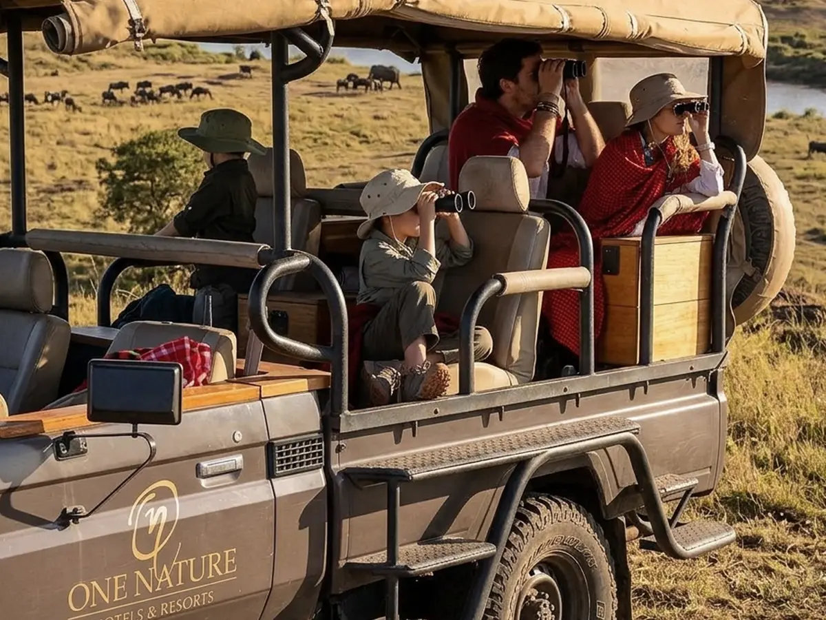 Lantern-lit outdoor cinema romance for couples at dusk in Africa’s wild settings.